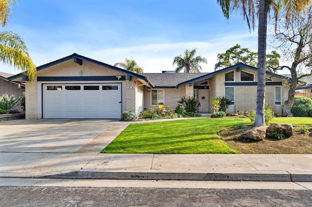 ranch-style house with a front yard and a garage