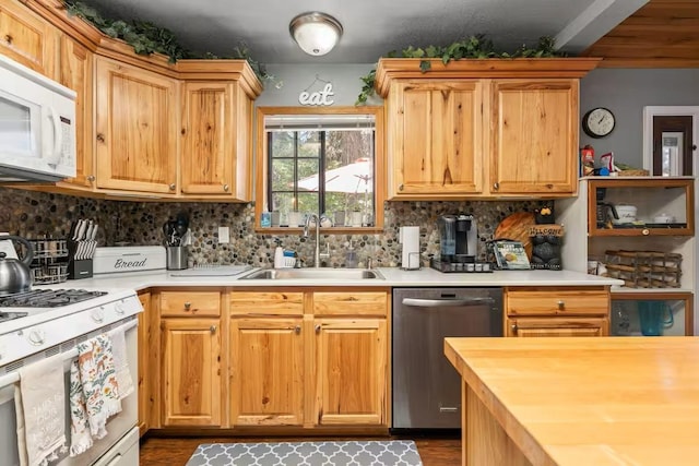 kitchen with decorative backsplash, wooden counters, white appliances, sink, and dark hardwood / wood-style floors