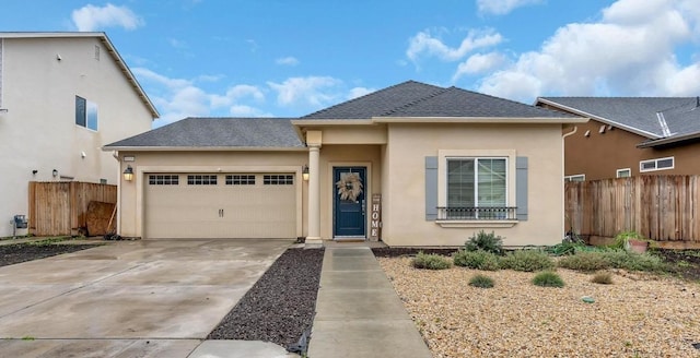 view of front of home featuring a garage