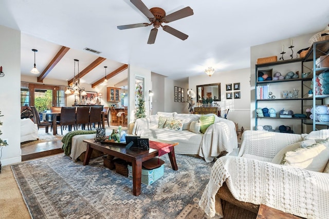 living room featuring vaulted ceiling with beams and ceiling fan