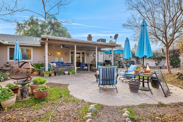 view of patio / terrace featuring ceiling fan