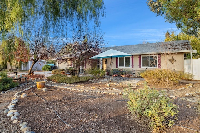 ranch-style house with a patio