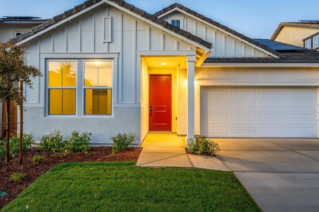 view of front of home with a garage