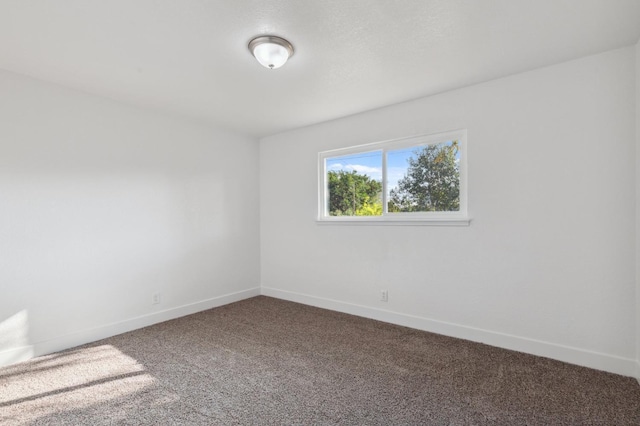 4756 E Woodward Ave, Fresno, CA 93702 - carpeted spare room with baseboards