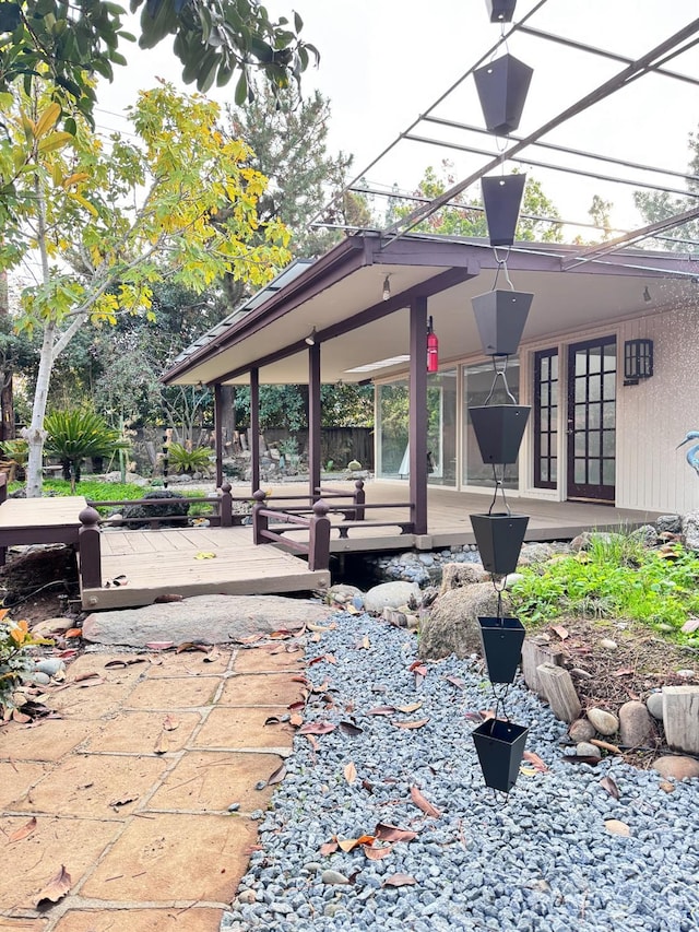 view of property's community with a wooden deck