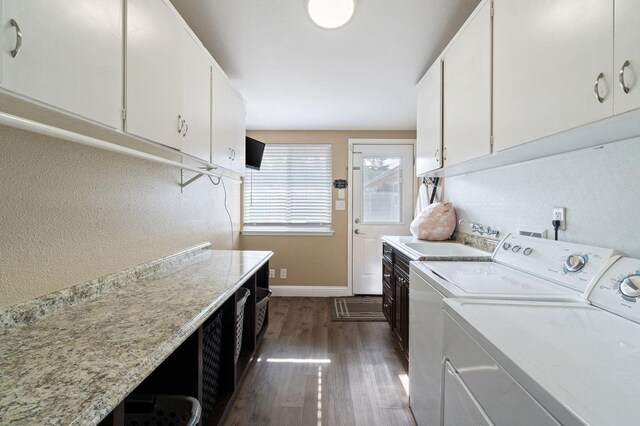 5870 E Midwick Ln, Fresno, CA 93727 - laundry room with a sink, dark wood finished floors, washer and clothes dryer, baseboards, and a textured wall