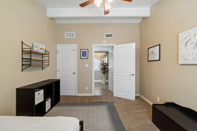 5870 E Midwick Ln, Fresno, CA 93727 - bedroom with carpet, baseboards, beamed ceiling, and a ceiling fan