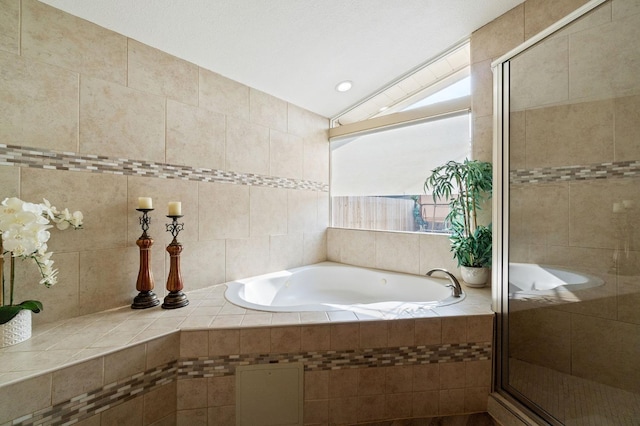 5870 E Midwick Ln, Fresno, CA 93727 - bathroom featuring a garden tub, a stall shower, and vaulted ceiling