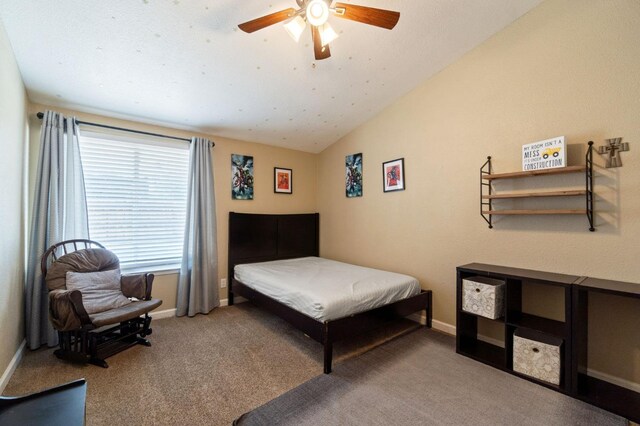 5870 E Midwick Ln, Fresno, CA 93727 - bedroom with light carpet, baseboards, vaulted ceiling, and a ceiling fan