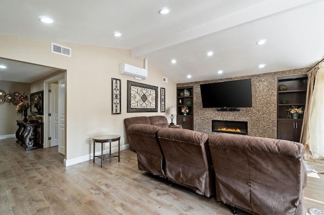 5870 E Midwick Ln, Fresno, CA 93727 - living area featuring baseboards, light wood finished floors, a fireplace, built in shelves, and recessed lighting