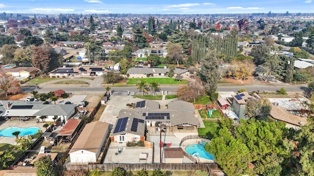 5870 E Midwick Ln, Fresno, CA 93727 - aerial view of property and surrounding area featuring a pool and nearby suburban area