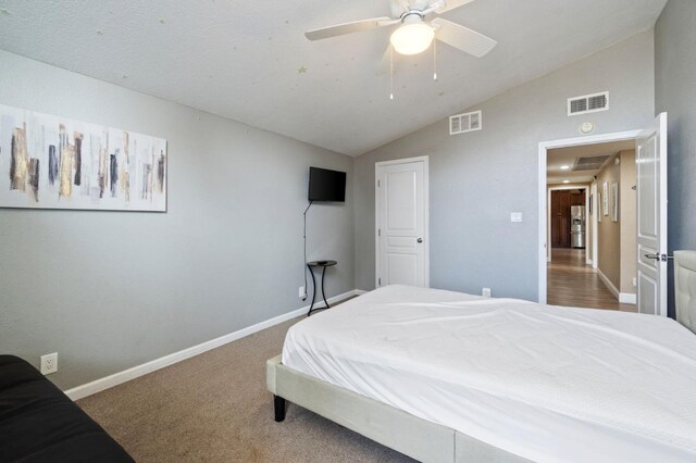 5870 E Midwick Ln, Fresno, CA 93727 - bedroom with vaulted ceiling, baseboards, and a ceiling fan