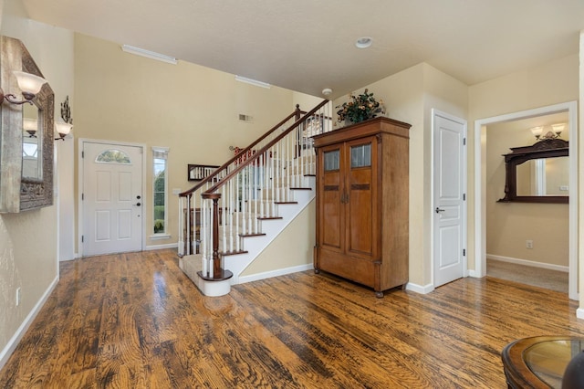 entrance foyer with dark wood-type flooring