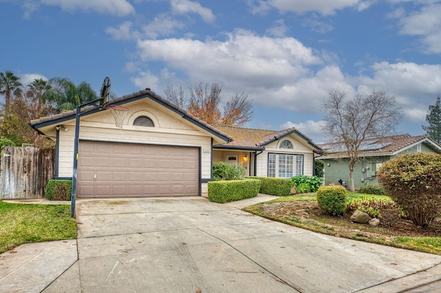 ranch-style house featuring a garage