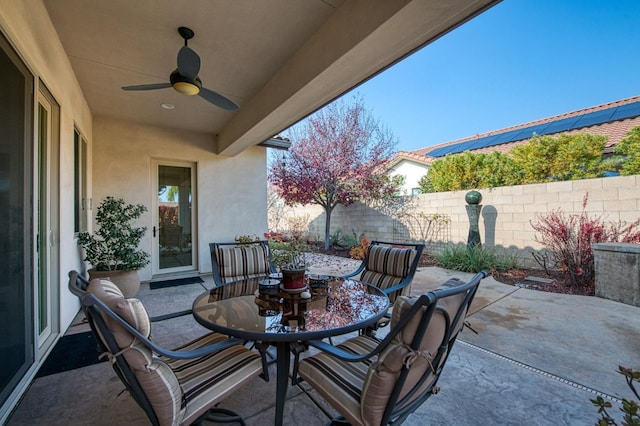 view of patio / terrace featuring ceiling fan