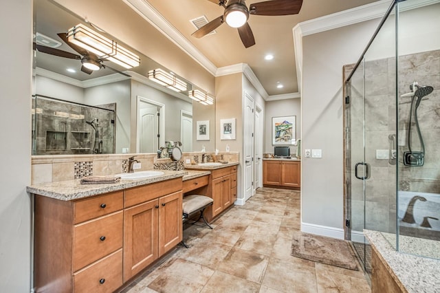 bathroom featuring ceiling fan, vanity, an enclosed shower, and ornamental molding