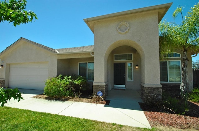 view of front of property with a garage