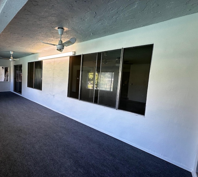 view of patio with ceiling fan