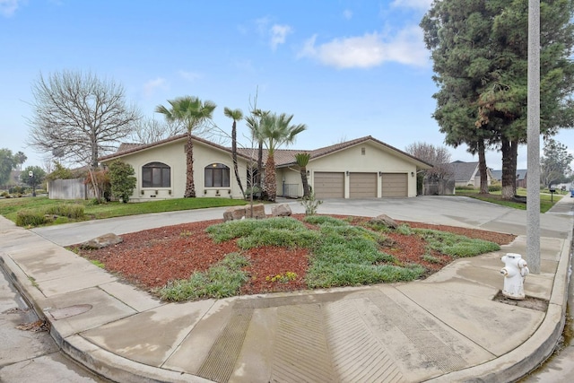 ranch-style home with a garage