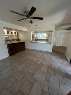 kitchen featuring ceiling fan