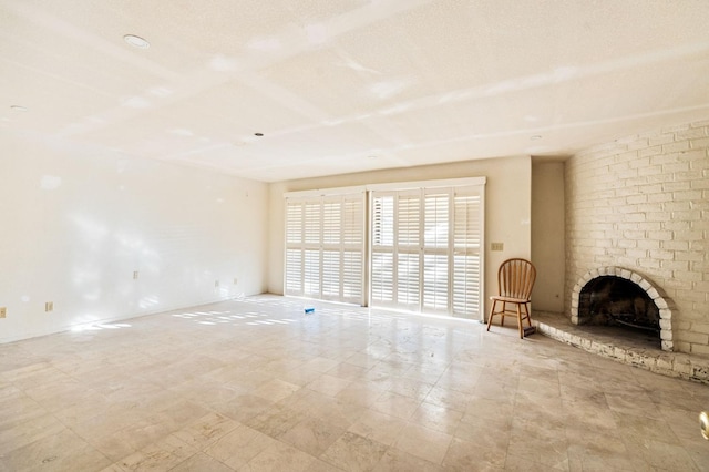 unfurnished living room with a fireplace
