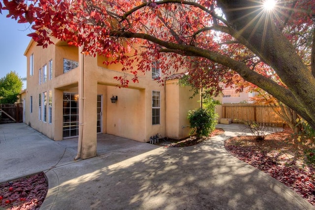 back of property with a patio area