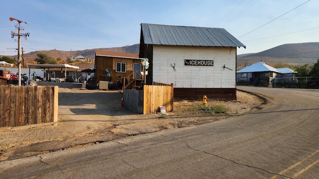 view of side of property featuring a mountain view