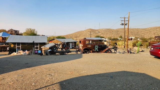 exterior space featuring a mountain view