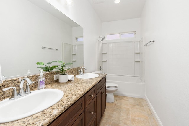 full bathroom with vanity, toilet, and washtub / shower combination