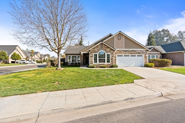 view of front facade featuring a front yard and a garage