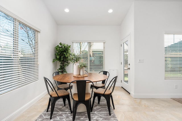 dining space with plenty of natural light