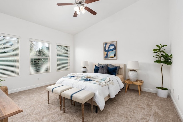 carpeted bedroom featuring vaulted ceiling and ceiling fan