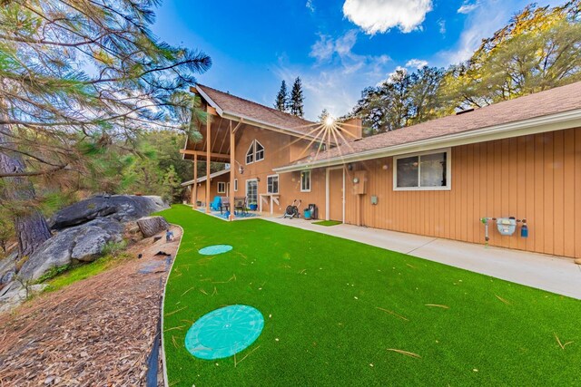 50365 Spook Ln, Oakhurst, CA 93644 - rear view of property featuring a patio and a lawn