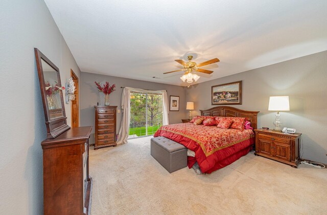 50365 Spook Ln, Oakhurst, CA 93644 - bedroom featuring light carpet, a ceiling fan, and access to outside