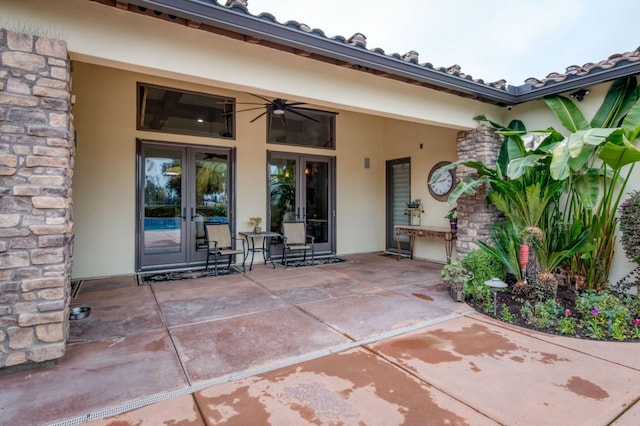 doorway to property with a patio area and french doors