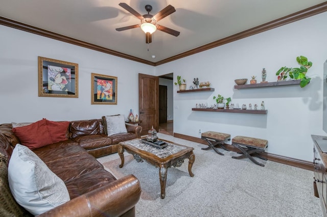 living room with ceiling fan and ornamental molding