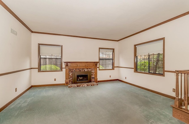 unfurnished living room featuring carpet flooring, a fireplace, crown molding, visible vents, and baseboards