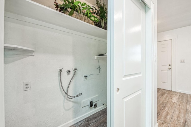 bathroom with hardwood / wood-style flooring