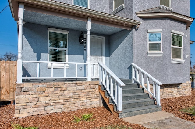 property entrance with a porch