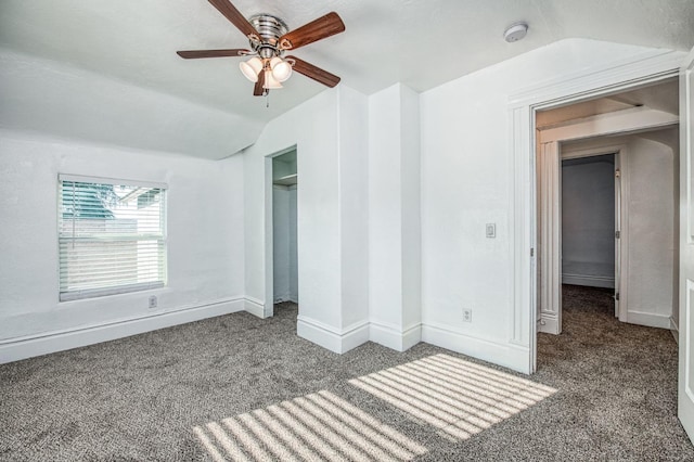 unfurnished bedroom featuring carpet flooring, ceiling fan, and lofted ceiling