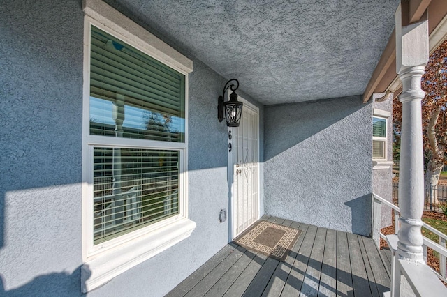 balcony featuring a porch