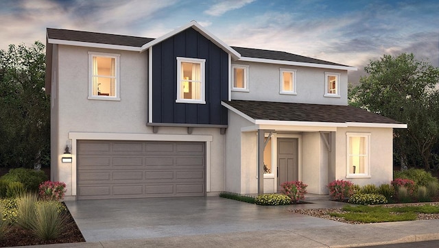 view of front of property featuring a garage