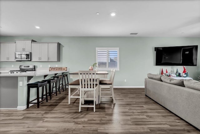 dining area with light hardwood / wood-style flooring