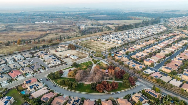 1445 E Via Roma Dr, Fresno, CA 93730 - aerial view of property's location featuring nearby suburban area