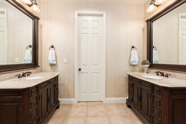 1445 E Via Roma Dr, Fresno, CA 93730 - full bathroom with wallpapered walls, baseboards, tile patterned flooring, and two vanities
