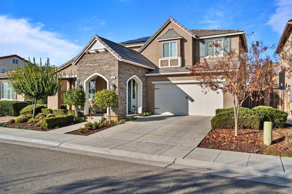 view of front of property featuring a garage