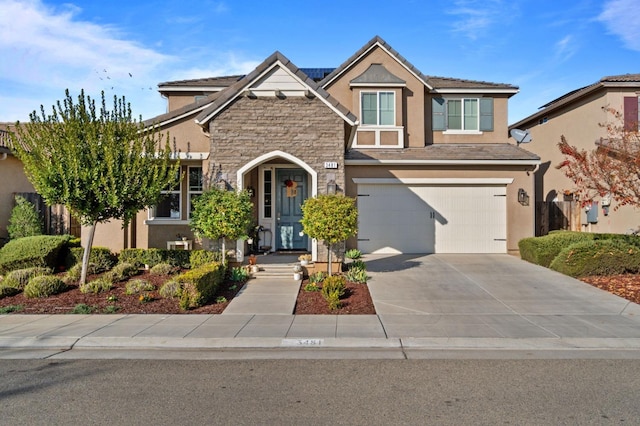 view of front of home featuring a garage