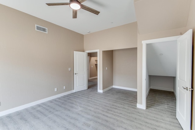 unfurnished bedroom featuring ceiling fan, a closet, and light hardwood / wood-style flooring