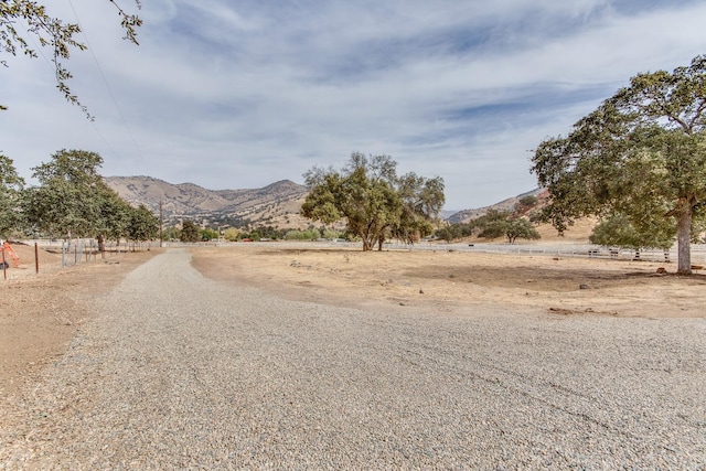 view of road featuring a mountain view and a rural view