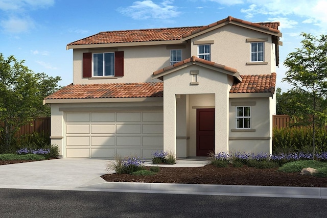 mediterranean / spanish-style house with a garage